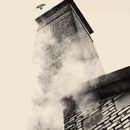 Vintage photograph of a chimney in black and white.